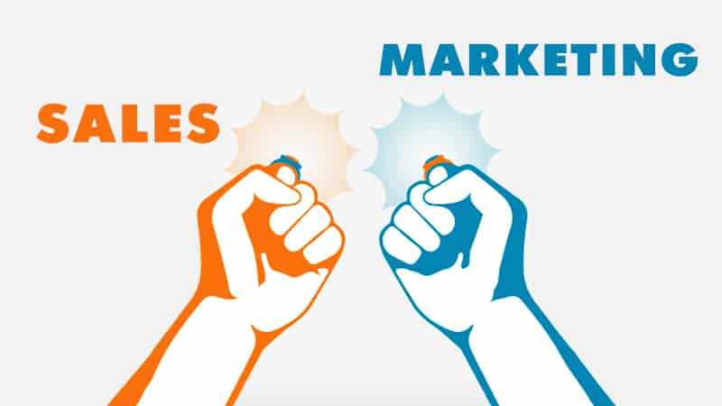 Graphic showing two fists 'sales' & ''marketing'